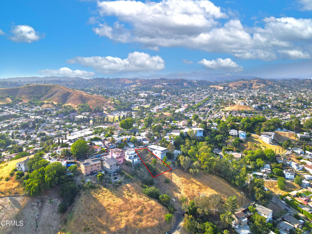 This 5996 sq ft vacant lot is located in a desirable El Sereno neighborhood, adjacent to Alhambra and South Pasadena, and just 5 miles from downtown LA. The site offers breathtaking views across the San Gabriel Valley, making it a rare opportunity to build your dream home in Northeast LA. With 3 new homes nearing completion nearby, this property showcases the area's appeal and the unique chance to build in a highly sought-after neighborhood. A soils report is available, giving you a solid foundation to start building your vision.