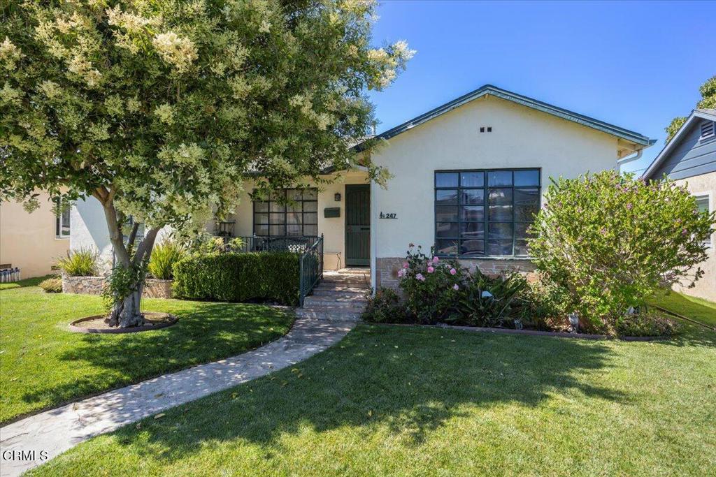 Charming Carty Tract Bungalow with Classic CharacterWelcome to 247 Douglas Ave -- a warm and inviting bungalow-style home nestled in the heart of Oxnard's sought-after Carty Tract neighborhood. Bursting with timeless charm and thoughtful updates, this 3 bedroom, 2 bath home offers a perfect blend of classic character and modern comfort.Step inside and fall in love with the cozy living room featuring a wood burning fireplace, original hardwood floors, and a built-in bookshelf that adds both function and vintage flair. A graceful arched entryway leads to the bedroom hallway, preserving the architectural charm that defines this unique home.The quaint front porch, framed by decorative iron railings, offers the perfect place to unwind and greet the day. Out back, enjoy a spacious backyard ideal for entertaining, gardening, or simply relaxing under the California sun.Additional highlights include, detached garage with extra space for storage or a potential workshop, newer tankless water heater, and newer AC/Heating unit.Located just minutes from local beaches, Ventura, Channel Islands Harbor, and the vibrant shops and restaurants at The Collection at RiverPark, this home offers both charm and convenience.