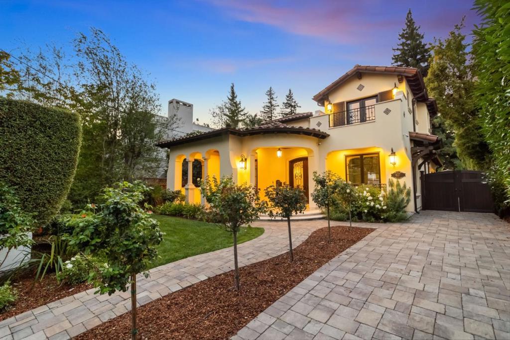 This Old Palo Alto home, built in 2015, showcases timeless European-inspired architecture and exceptional amenities. The 3-level floor plan is ever so spacious with 6 bedrooms, a dedicated office for remote work, and 6.5 baths. Plus, there is a detached studio with bath for additional work space or guests. There is a main-level bedroom suite, 3 upstairs suites including the primary, plus 2 bedrooms and 2 baths on the lower level. There is a spacious lower-level recreation room with full bar, private home theater, and a wine cellar worthy of a collector. One of the baths on this level has a steam shower and sauna for ultimate relaxation. Smart systems, multiple laundry areas, and abundant skylights enhance comfort throughout. Inviting rear yard with fireplace loggia and built-in barbecue, plus detached 1-car garage. This prime location is just blocks to Rinconada Park, one mile to downtown Palo Alto, minutes to Stanford University, and access to acclaimed Palo Alto schools.