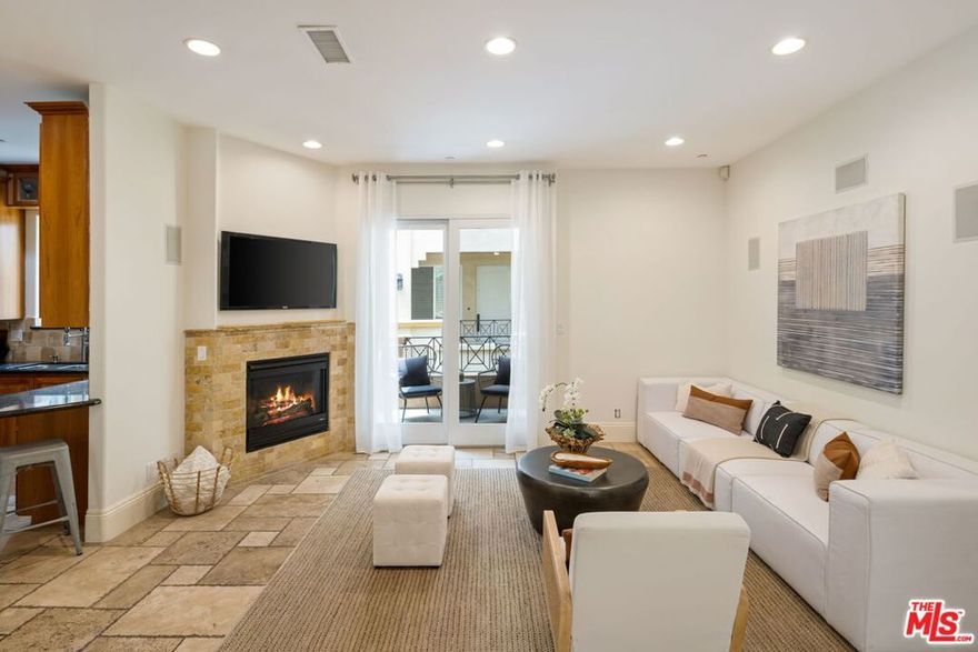 Move right into this light, bright, and quiet unit. Built in 2007, this 2 bedroom has an open floor plan with a lovely dining room, chefs kitchen, and cozy fireplace. Primary retreat with sitting area, handsome stone fireplace, generous walk-in closet, hotel spa-style bath with over-sized walk-in glass door shower, large tub, & double sinks. Building amenities: well-equipped gym, comfortable lounge/game room, elevators, secured gates, guest parking & more. Wonderful location, close to Temescal Canyon Park, Palisades Village and the beach.