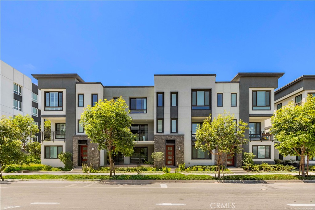 Welcome to this Luxurious and almost compltely remodeled newer home in the LUX community Irvine, with only 39 contemporary homes available, it islocated in the heart of the Irvine Business Complex, and offers easy access to all that Irvine has to offer. when you step in, you will be swept away by the designer upgrades and stylish finishes. The open floor plan allows for plenty of natural light and easy entertaining, while the hardwood floors add a touch of luxury. The kitchen with stainless steel appliances, quartz counters and an oversized island that is perfect for cooking or gatherings. There is also plenty of storage space thanks to the built-in cabinetry. Each bedroom is generously sized and has its own luxurious finishes. There is one flexible room located on the lower level can be used as office or gym and three bedrooms and 2 bathrooms on the upper level. The master suite features vaulted ceiling, a large walk-in closet and a spa-like bathroom with dual sinks, a large walk-in shower. 2 car garage and zoned for highly sought after Irvine Unified Schools (University high). Don't miss out on this incredible opportunity.