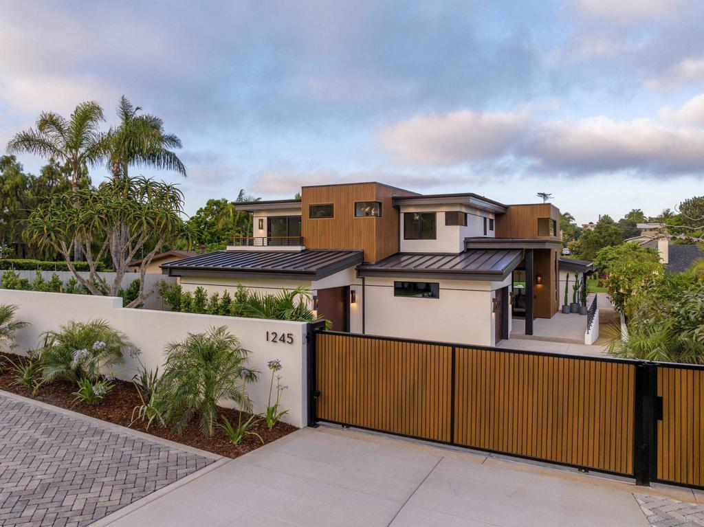 Modern masterpiece on an almost half-acre lot by award-winning homebuilder Tourmaline Builders. Open and spacious, yet warm and inviting. The great room with professional kitchen and bar opens to a large covered porch -- it's built to entertain. Or retreat into the private media room. The expansive yard is an oasis with a pool and outdoor kitchen, and an ADU that doubles as a pool house. Stunning custom detailing and design.