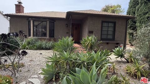 Photo of 2411 Castle Heights Avenue, Los Angeles, CA 90034 (MLS # 26694057)