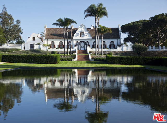 Constantia, an estate of unparalleled quality located in the heart of Montecito. Juxtaposed between the mountains and the sea this Cape Dutch Colonial masterpiece, placed on approximately 3.5 acres, harkens back to a more elegant time but with the conveniences of a 21st Century home.Originally designed by Ambrose Cramer, this residence is an oasis of verdant tranquility. Enjoy a gourmet's dream kitchen, light-filled with cathedral ceilings. Relax in a warm, beamed great room that fills the eye with magnificent scenery at every turn. Revel in a media room built for earnest entertainment. Meander around a reflecting pond reminiscent of the great estates of Europe. Dive into a stunning pool that embodies the spirit of Summer in Southern California. Meticulous gardens, expansive lawns, and ebullient entertaining areas abound. The spectacular views of Montecito Peak and the shimmering waves of the Pacific Ocean make this home one of the crown jewels of Southern California.