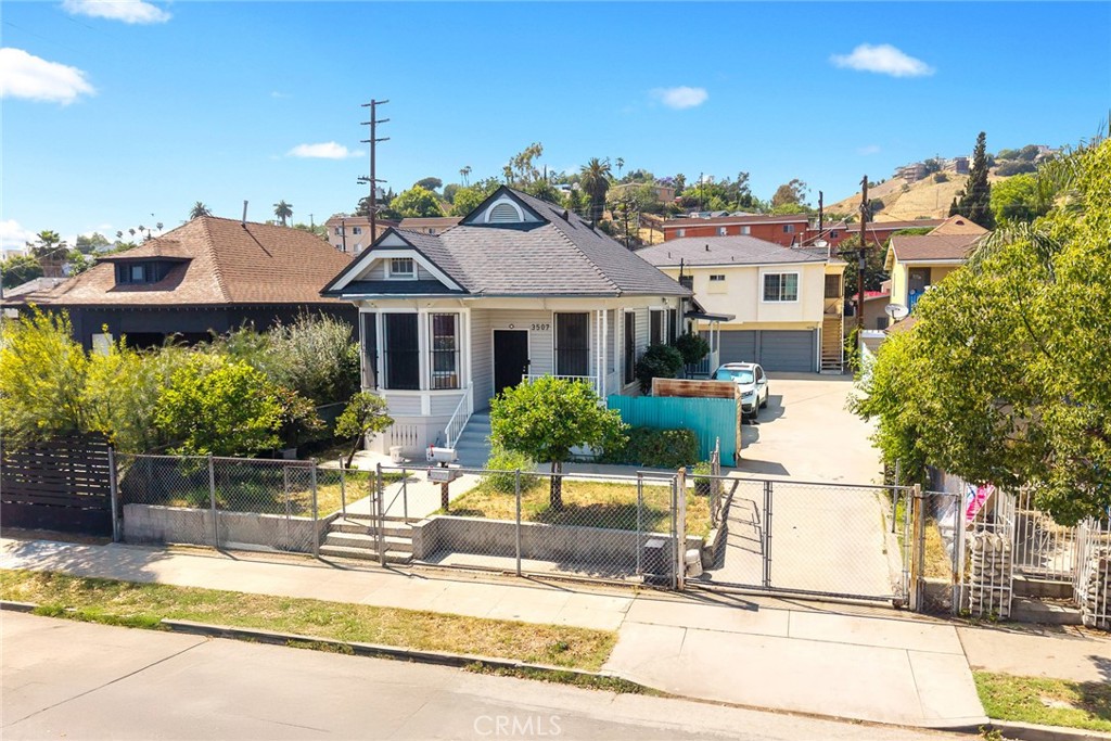Welcome to an exceptional investment opportunity and great owner-user property in the vibrant and rapidly growing neighborhood of Cypress Park! This ideally located triplex features three separate units, offering strong income potential in one of Northeast LA’s most sought-after communities. The main front house has 2 bedrooms and 1 bathroom, as well as a bonus room. The rear structure consists of 3 single car garages with 2 more units above. Units 2 & 3 are each 1 bedroom and 1 bath.
Conveniently located just minutes from Dodger Stadium, the LA River Greenway, Frogtown, Highland Park, and Mount Washington, this triplex is surrounded by a thriving local scene. Trendy coffee shops, dining spots, and boutiques are just blocks away. Easy access to the 110 freeway makes commuting downtown or to Pasadena a breeze.
Live in one unit and rent the others, or add a strong-performing asset to your portfolio in a neighborhood with rising rents and high demand.