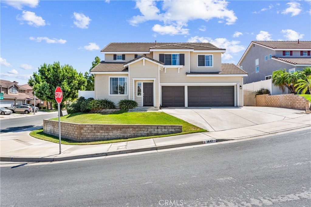 Welcome to your new home at 1447 Lochaber Ct! This 3 bed/2.5 bath + loft sits on the corner of a small cul-de-sac and is just down the street from Sycamore Highlands Park - known for its hiking, biking, picnicking, and breathtaking sunsets. Once inside the home, you'll be greeted with tons of space, lots of natural light, and a place where memories will be made. The family room right off of the entryway can be used in multiple ways, such as a lively game room, a more formal living/dining room, or an epic hangout spot for family/friend gatherings. As you pass the half bath, you'll enter into the kitchen which offers a walk-in pantry and a kitchen island that's perfect for hosting pizza night or a holiday meal. The eating area can easily sit six comfortably, and the living room provides a cozy spot to relax on the couch. Upstairs, you'll find the primary bedroom with an ensuite, two guest bedrooms, another full bathroom, a separate laundry room, and the loft that makes for a great work-from-home office. Lastly, the backyard offers both a covered patio for shade and an uncovered patio area for sun. During those cooler nights, you can sit back and relax in the above-ground, heated spa. Additional features include a new, vinyl privacy fence, a freshly-painted exterior, quartz countertops in the full bathrooms, RV parking, and close proximity to the freeway, UC Riverside, shopping, and more!