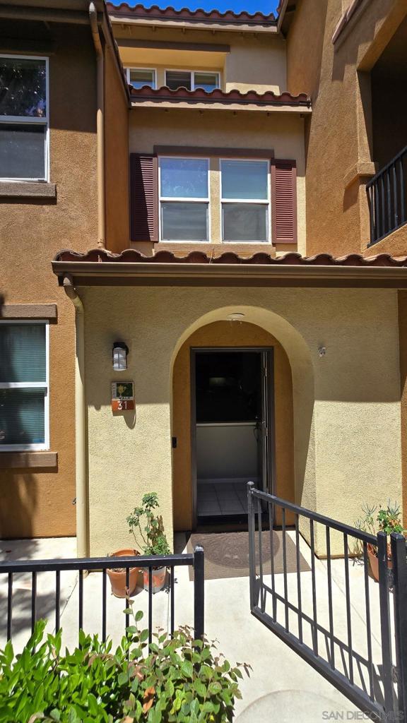 Welcome to one of Legacy Walk community's most spacious and recently updated condominiums. This three story unit has something for everyone and comes with a large side by side 2 car garage with space for storage! There is attic space for even more storage. See the robust water softener system and let us know if you have any questions. The master bedroom and bathroom comes with a walk in closet all of which is extremely comfortable and takes up the entire floor for added privacy. You can use one of the other 3 bedrooms for a private office or there's also a roomy open area on the 2nd level for a home office work area if the family or tenants use all the other bedrooms. The front door takes you to the inviting family and dining rooms. There's an open pantry area next to the highly functional kitchen with all the appliances you would expect and a convenient breakfast bar. There is built in cabinet spaces throughout plus a separate laundry room. This home is ideal for those seeking a comfortable residence in a secure community close to all San Diego employment centers, family conveniences, while just minutes to the San Diego Bay, Coronado beaches, and the vibrant energy of Downtown San Diego.
