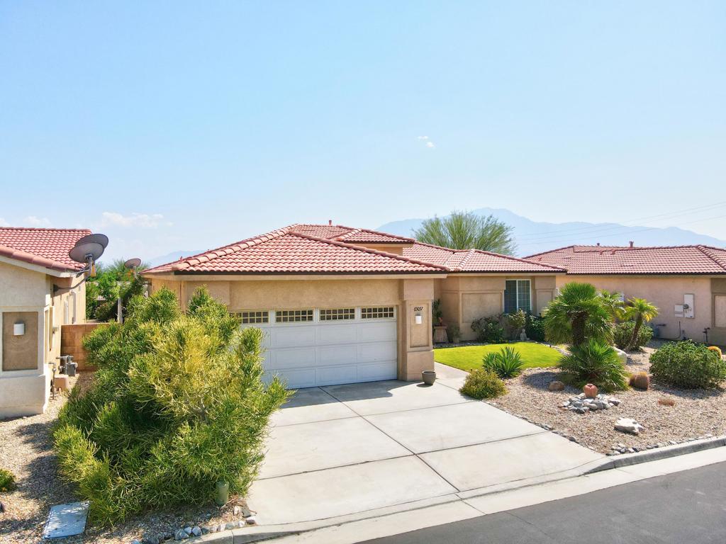You Want a move-in ready home with Low HOA, and stunning Mountain Views, located in a 55-plus community! The 3 bedrooms and 3 baths of this 2172 square foot home have an open feel and flowing spaces with the Living room open as the heart of the home looking out to the majestic San Jacinto Mountain top. Balanced with the bedrooms split between wings you can have the privacy you want when family or guests are visiting. 2 Bedrooms have direct access to the patio where you will be spending a lot of sunrise and sunsets taking in the peaceful scenes. The Kitchen is open and spacious and will make Holiday cooking, family meals, and entertaining friends a delight. The home is surrounded by custom low-maintenance landscaping in the front and back. You will for sure spend most of your time on the amazing patio relaxing in the twilight watching the sun sink behind the mountains. Morning coffee will be relaxing as you take in the mountain views to get your next inspiration or let out the stress of the day. The home has a flex room that can be used as a den or office. Low HOA, Mountain Views, located in Paradise Springs 55 Plus Community! This home is ready for you today.