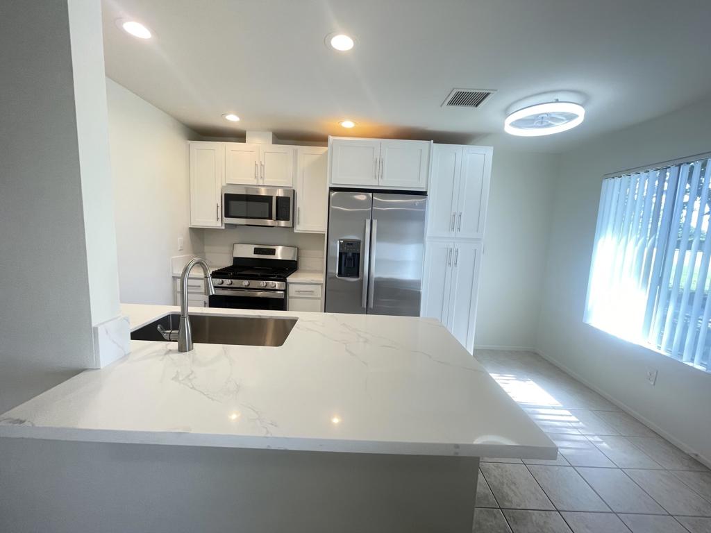 Looking for a Gorgeous, Newly Remodeled, Lovely Get-Away Home or a Long or Short-Term Rental located on a Golf Course with Southern Santa Rosa Mountain View's; You have Arrived! Currently, the Only Condo Available located on the Golf Course. Totally Remodeled New Kitchen Cabinets with Soft Close Hardware, adjustable shelves, Appliances including Refrigerator, Range, Microwave, Dishwasher, Garbage Disposal, Stainless Steel Farm Sink, Large Double Door Pantry Cabinet with Pull-Out Shelves, Plus a Unique Washer and Dryer Combination located next to the Kitchen Sink. New LED Lighting in the Kitchen and Living Room. New Carpet in the Bedrooms, New Ceiling Fans with a Light in the Kitchen, Living Room, and Both Bedrooms. New Paint, New Mirrored Wardrobe Doors in Master Bedroom. New Bathroom Vanity with Lots of Storage, New Toilet, Mirror, Medicine Cabinet, and Hardware. 3-New Milgard Windows and a Sliding Door in the Master bedroom to be Installed in a Couple of Weeks. Newer Energy Efficient AC System recently installed. Several Community Pools and Spas. HOA includes Fitness Center with Pickleball and Tennis Courts, Plus a Lap Pool. This is a Fabulous Home. Hurry, it Won't Last! Note: when using GPS, use 82567 Costello Unit 36, not Avenue 48.