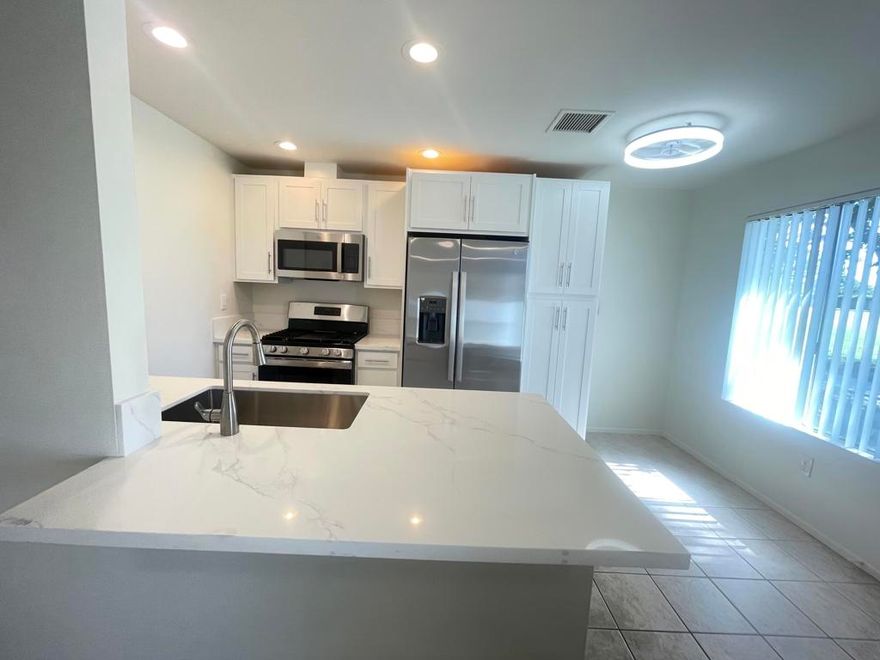 Looking for a Gorgeous, Newly Remodeled,  Lovely Get-Away Home or a Long or Short-Term Rental located on a Golf Course with Southern Santa Rosa Mountain View's; You have Arrived! Currently, the Only Condo Available located on the Golf Course.  Totally Remodeled New Kitchen Cabinets with Soft Close Hardware, adjustable shelves, Appliances including Refrigerator, Range, Microwave, Dishwasher, Garbage Disposal, Stainless Steel Farm Sink, Large Double Door Pantry Cabinet with Pull-Out Shelves, Plus a Unique Washer and Dryer Combination located next to the Kitchen Sink. New LED Lighting in the Kitchen and Living Room. New Carpet in the Bedrooms, New Ceiling Fans with a Light in the Kitchen, Living Room, and Both Bedrooms. New Paint, New Mirrored Wardrobe Doors in Master Bedroom. New Bathroom Vanity with Lots of Storage, New Toilet, Mirror, Medicine Cabinet, and Hardware.  3-New Milgard Windows and a Sliding Door in the Master bedroom to be Installed in a Couple of Weeks. Newer Energy Efficient AC System recently installed. Several Community Pools and Spas.  HOA includes Fitness Center with Pickleball and Tennis Courts, Plus a Lap Pool. This is a Fabulous Home.  Hurry, it Won't Last! Note: when using GPS, use 82567 Costello Unit 36, not Avenue 48.