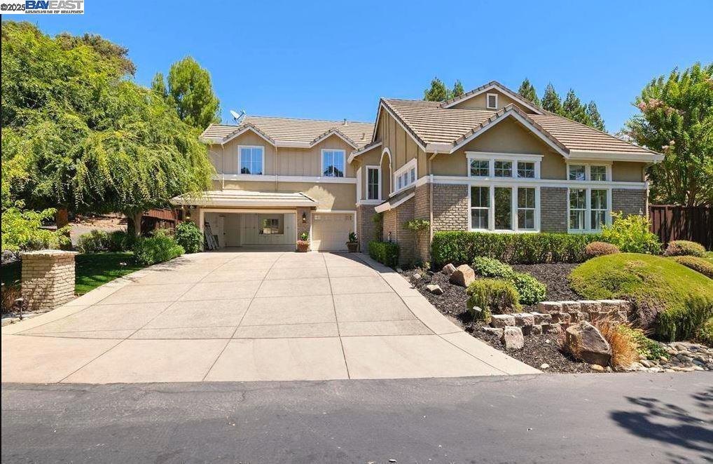 Welcome to this modern, fully updated, family-friendly 5-bed, 3-bath executive home. The main level includes a FULL bedroom/ bath, perfect for guests. With 3,195sq ft of living space, this home offers aperfect blend of family comfort and upscale entertaining. Grand marble entry sets the stage with soaring ceilings, hardwood and tile floors, and elegant finishes throughout. The chef’s kitchen features quartz countertops, white cabinetry, a large island, a large walk-in pantry, Viking & Thermador appliances, and a wine cooler, opening to the spacious family room with a fireplace and custom built-in media center. Upstairs, four additional bedrooms surround a central bonus/media room, while the elegant bathrooms are appointed with Restoration Hardware finishes. A large laundry room with sunken sink, cabinetry, washer, and dryer adds everyday convenience. The beautiful FLAT backyard offers fruit trees, room to relax, and the potential for a pool. Additional highlights include a 3-car garage with EV charger, Nest thermostats, and NEW HVAC system. Enjoy the serenity of this GATED community with its peaceful creek setting, while being just minutes from top-rated Walnut Creek schools, Alamo & Danville downtowns, Roundhill Club/ GREAT SCHOOLS- Min Freeway noise -OPEN HSE SAT/SUN-1.30-4PM!
