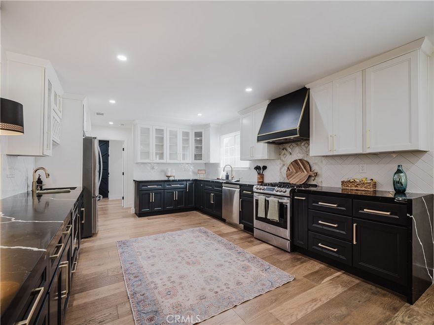 Talented Contractor Upgraded for HIS Family. Now it can be your home. Welcome home to incredibly detailed upgraded 6-bedroom, 3.5-bathroom home in a quiet West Hills pocket with minimal through traffic and highly rated schools. At just over 3,000 square feet on an oversized 10,984 sq ft lot, this property is designed for comfortable multigenerational living, serious entertaining, or simply enjoying life at home. No detail has been skipped in this delightful home. Inside, you’ll find a bright open layout with high-end upgrades in every detail—smart backlit mirrors, built-in appliances (including microwave, washer/dryer, and wine cellar), ceiling fans in every room, and an 82" family room TV with a recessed electric fireplace. The dedicated office with a closet easily converts to a 6th bedroom. Two bedrooms offer direct patio access. The primary suite is a true retreat with a walk-in closet featuring custom drawers and shelves, and a beautifully renovated spa-like bathroom. Out back, it’s resort-style living with ~1,000 sq ft of Trex decking (no maintenance needed), artificial turf, a propane fire pit, outdoor dining under a gazebo, and full outdoor kitchen with a gas grill, sink, and beverage fridge. There’s even a covered fridge and freezer, ceiling fans, and tiki torch lighting for warm summer evenings. Play features include a 12x24' Intex pool, trampoline, basketball court, swing set, slide/playhouse, and zip line. Yes, really. Smart home features include 4 Ring cameras and a Eufy smart lock. Included is exterior storage, perimeter lighting, and tasteful greenery. The lush backyard play yard is included in the sale (or can be removed at buyer’s request). Offered furnished for $7,995 or unfurnished for $6,995 —this is a turnkey property with flexible options. Inclusions (negotiable): Interior furnishings, refrigerator, washer/dryer, living room TV. Exterior: Ring cameras, smart lock, generator, storage units, outdoor fridge/freezer, herb gardens, swing set, pool + accessories, trampoline, basketball court, backyard furniture, fire pit, outdoor TVs. The fully permitted garage 1+1, 441sqft ADU has its own address (23662), separate lighted entry, ALSO AVAILABKLE TO RENT for 2,250.   Tenant to verify all square footage and home details