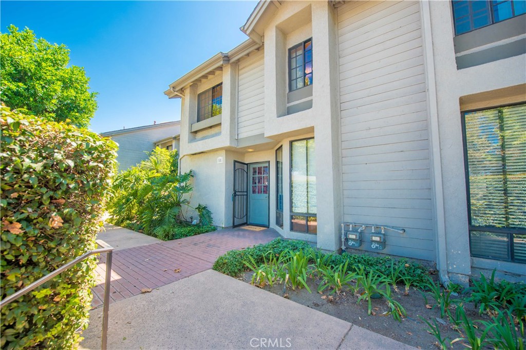 Upgraded 3 Bedroom, 2 1/2 bath Condo Located in Prime Fullerton Location Near Top Schools & Amenities
This beautifully remodeled condo is ideally located within walking distance of Troy High School, Fullerton College, and California State University, Fullerton. Enjoy the convenience of nearby Costco, Sam’s Club, and an abundance of shopping and dining options just steps away.
Despite its central location, the condo offers exceptional privacy and tranquility. The windows facing Chapman Ave are double-paned, and the private patio is enclosed by a tall fence/wall for added seclusion. Great location by the pool!!
The home has been thoughtfully upgraded throughout, featuring:
Fully remodeled kitchen with custom cabinets and built-ins, quartz countertops with a designer backsplash, laminate wood flooring, loads of natural light and an open concept dining and family room.
Primary suite has vaulted ceilings, abundant natural light, a separate shower, jetted tub, and a balcony to relax on. The second upstairs bedroom has its own private bath that has also been remodeled. The third room is on the first floor, and is currently being used as an office/extended kitchen space.
This home boasts lots of storage and a detached 2 car garage. Come make it your own!