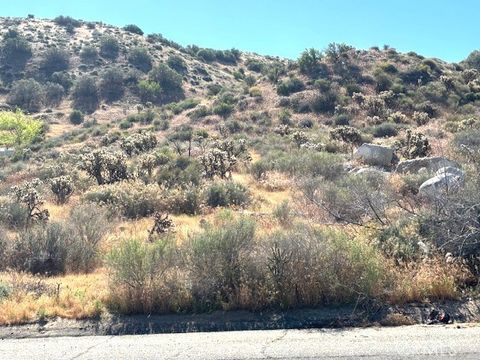 Photo of 54025 Ridge Road, Yucca Valley, CA 92284 (MLS # JT26065784)