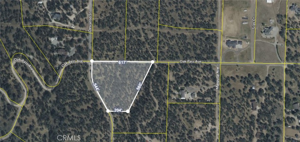 Welcome to this amazing piece of oak studded land, a true gem awaiting discovery. Nestled in the heart of nature's grandeur, this property offers a unique opportunity to embrace tranquility amidst a breathtaking landscape. The land itself is gently undulating, with a variety of topographical features that add interest to the terrain. The property's elevation offers captivating views of the surrounding countryside, inviting you to soak in the panoramic vistas of meadows, distant mountains, and the changing colors of the sky. An abundance of wildlife calls this land home, and it is not uncommon to spot deer gracefully grazing or hear the melodic songs of birds echoing through the air. The oak trees provide a sanctuary for countless species, creating a harmonious ecosystem that invites you to connect with nature on a profound level. The possibilities for this land are as vast as the horizon itself. With plenty of space to create your dream oasis, you can envision a custom-built home, sprawling gardens, or even a private retreat that harmonizes with the natural beauty surrounding you. Whether you seek solace from the demands of daily life or a canvas to manifest your vision, this is the perfect backdrop to bring your dreams to life. Located within convenient proximity to modern amenities, yet tucked away in a private enclave, this oak studded land offers the best of both worlds. Enjoy the seclusion and tranquility of nature, while still being connected to nearby towns, shopping centers, and recreational activities.