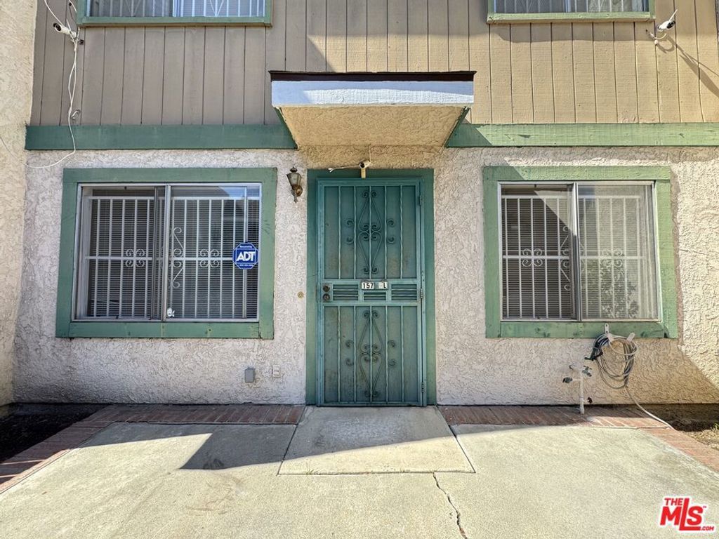 Photo of 157 S Wilmington Avenue #L, Compton, CA 90220 (MLS # 25608881)