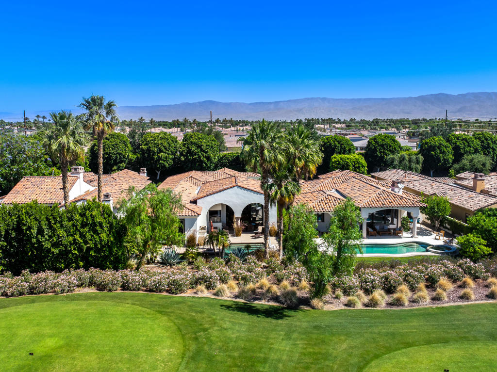 Plan 4 Villa (most popular great room floor plan), with sought after South exposure, in the prestigious Hideaway Golf Club in La Quinta. Three bedrooms plus a den, three bathrooms and a powder room (including casita with a separate entrance). Enter through a lovely, gated courtyard with a bubbling fountain into the foyer entrance. The open great room floorplan has a spacious living area, a formal dining room plus a custom kitchen and wet bar perfect for entertaining. An attractive primary suite boasts a luxurious bath with spa-like ambience, including a walk-in closet. The backyard patio area has an outdoor loggia with a dining area and barbecue station plus a custom pool and spa, for the ultimate in indoor/outdoor desert entertaining! The interior and exterior of the home were recently painted. Hideaway Golf membership is required with purchased.
