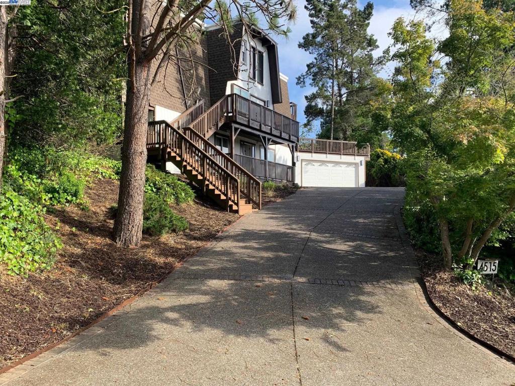 Most sought after Parsons Estate area, custom homes, big lots! AWARD winning great schools!! Gorgeous SWISS CHALET style home, awesome vacation atmosphere surrounded with lots of trees! High wood beam ceilings. Airy, bright home with open floor plan! Large living room with patio opens to large composite material deck with view of hills, formal dining! 3 big Anderson patio doors, lots of beautiful Anderson windows, 2 Bedrooms with patio doors open to decks. Huge 4th Bedroom Room with fireplace, with big deck, view of hills!! Big living room, open to deck. House has LOTS of natural LIGHTS! Modern updated baths. kitchen, newly refinished hardwood floors ! Newer outdoor/indoor paint. Down Stairs Has a In-Law Quarters with private access has 2 Separte Rooms Use as a rental income Oversized garage, long driveway fits 4 cars. Lake Chabot located at the back of Parsons Estates Neighborhood. Minutes Walk to Lake Chabot for boating, fishing, good food at Kiosh to Beautiful most popular Lake,!