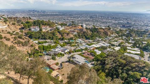 Photo of 1865 Marcheeta Place, Los Angeles, CA 90069 (MLS # 25605389) Photo of 1865 Marcheeta Place, Los Angeles, CA 90069 (MLS # 25605389)