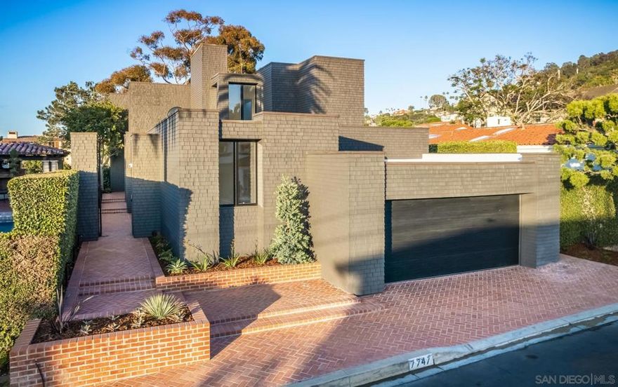 Blue Pacific, coastline, and whitewater views. Designed by acclaimed architect, Rod Youngson, this exquisite home is refined and sophisticated, airy and crisp, with an essence of lightness. Newly and thoughtfully modernized, while maintaining its timeless design, it is stunning. The living room is something to behold with tall glass walls overlooking sweeping ocean and canyon views, clean lines, and magnificent volume. Flow to the large, private courtyard is immediate, creating an inviting indoor/outdoor environment.  This home has never been on the market. The original owners commissioned Rod Youngson to create their vision with purity, artistry and function in mind. Mr. Youngson strove for simplicity, quality, and perfect proportions; for drama and romance but never ostentation. There are 3 en-suite bedrooms, a beautiful den/office overlooking greenery which can be used as a 4th bedroom, and a gourmet kitchen open to light-filled living and dining spaces. Situated on a cul-de-sac in close proximity to the Village of La Jolla, the Cove, and La Jolla Shores, this home is a gem.