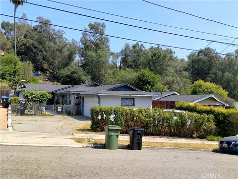 Photo of 5845 5847 E Burwood Avenue, Los Angeles, CA 90042 (MLS # GD25159046)
