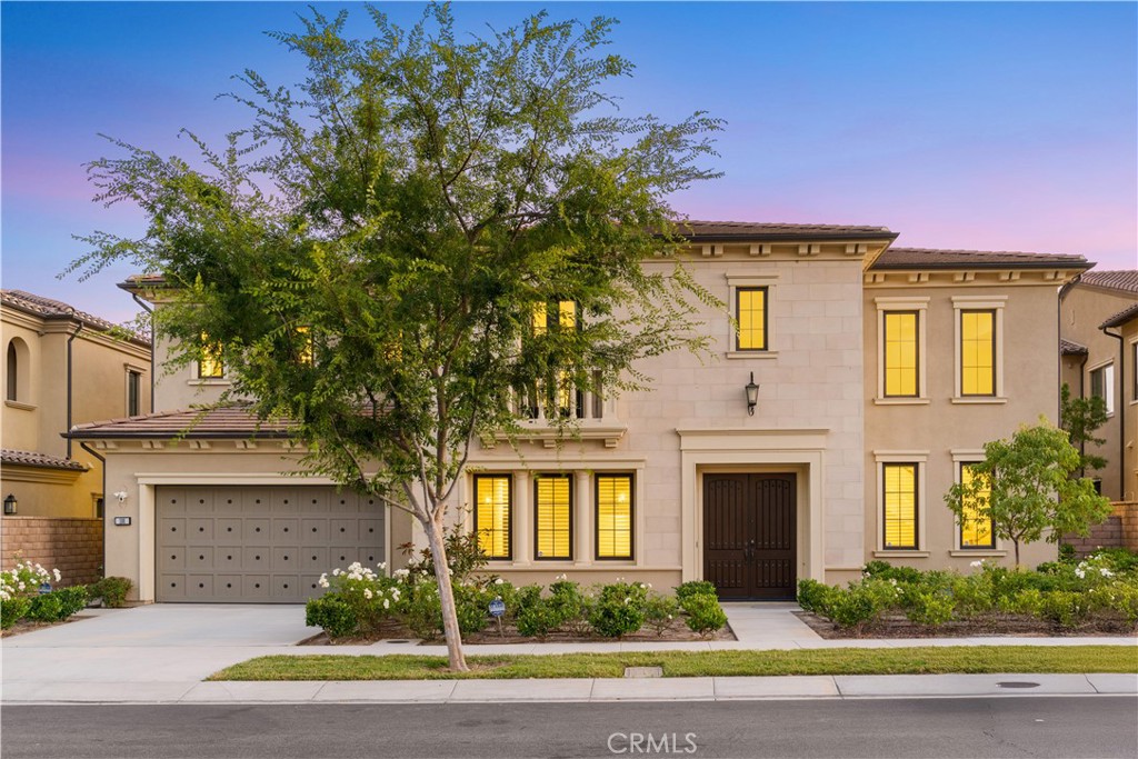 PANORAMIC VIEW HOME! GATED community of Grove at Orchard Hills! The stunning property offers a perfect floorplan providing 5 bedrooms, 5 full bathrooms, and one powder room. High ceilings and curved stairs once step into the luxury home. The open floor plan seamlessly joins the living room, dining room, and gourmet kitchen. There are prep kitchen and pantry which is perfect for chef. Sliding doors lead you to a private view yard and seamlessly connect indoor and outdoor spaces. The primary suite upstairs features a big walk-in closet, a tub, a walk-in shower, and dual sinks.The master bedroom has a balcony with a breathtaking view. The nice home with a bunch of windows provides lots of natural light and makes it bright all day. Amenities include two community pools, tennis and basketball courts, a soccer field, and a playground. Enjoy award-winning schools. Orchard Hills Elementary School and Beckman High School.