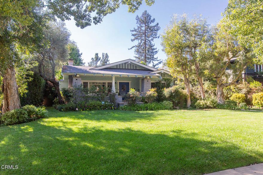 This timeless 1913 Craftsman in Pasadena's coveted Madison Heights neighborhood blends historic charm with modern comfort. Known as the Simpson House, it has been recognized by the City of Pasadena as a contributor to a potential Madison Heights Landmark District--a rare opportunity to own a piece of the city's architectural heritage.Set back from the street and amongst mature landscaping, this home greets you with classic Craftsman details -- a broad front porch, tapered columns, wood siding, and original windows that flood the home with natural light. Inside, period character abounds with hardwood floors, original built-ins, box-beam ceilings, and wood-burning fireplace in  the formal living and a decorative fireplace in the dining room.This 4-bedroom, 2.5-bath home offers 2,681 sq ft of beautifully preserved charm with thoughtful modern updates. The flexible layout includes one bedroom currently used as an office/gym...ideal for today's lifestyle. The formal living room features a wood-burning fireplace and opens to the adjacent dining room, where a second fireplace adds warmth and character for gatherings. Just beyond, the kitchen flows seamlessly from the dining room, making it perfect for both daily living and entertaining. A cozy den nearby offers additional versatility, whether as a reading nook, media room, or play area.The kitchen features a center island, abundant cabinetry, and direct access to a private side patio through French Doors. The primary suite offers views of the expansive, flat rear yard, framed by mature trees and spacious enough to accommodate a pool. Additional outdoor highlights include a back porch, rear patio, and a detached garage.Centrally located, this home offers the perfect blend of architectural character, thoughtful updates, and a prime location. Rich in history and timeless in appeal, it's a true Madison Heights classic--ready for your personal touch.