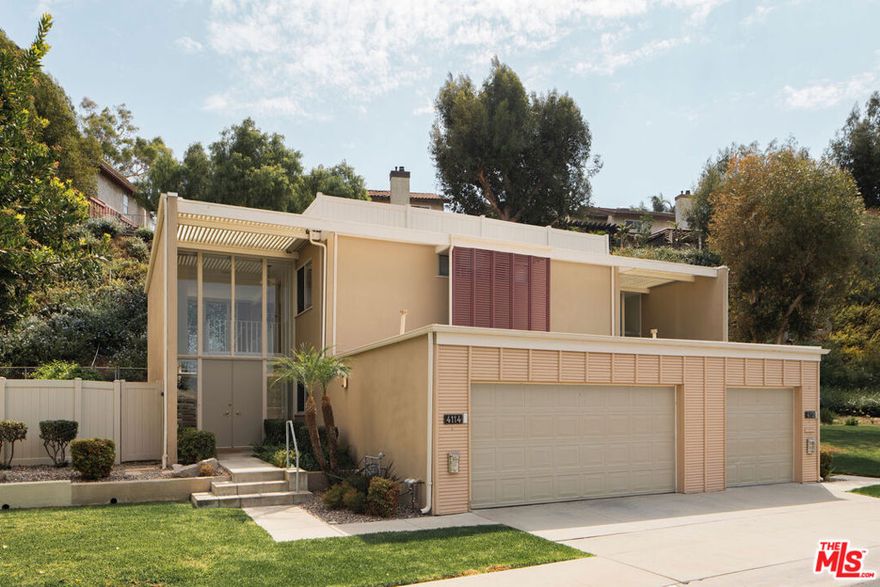 On acreage that had previously been home to pasture and training facilities for his family's thoroughbred racehorses, architect Clifton Jones Jr. developed a tract of distinguished garden home duplexes. Named Cerritos Circle, its modernist post and beam designs clearly display the influences of his studies at the USC School of Architecture. Offered here is the Plan D model, with both residences featuring dramatic double-height living/dining areas, sculptural spiral staircases, floor to ceiling walls of glass at east and west facings, and each unit having its own private patio and outdoor area. As side by side units, each has the feeling of being its own single family home. They were designed in such a way that owners could live in one and rent out the other, with privacy between units having been a primary consideration in the design. Both feature 2 bedrooms / 2.5 baths, well organized open plan kitchens, and spacious living/dining areas. Located in Long Beach's highly desired Los Cerritos/Virginia Country Club neighborhood: with tree lined streets, historic homes, excellent school district, adjacent Dominguez Gap Wetlands + nearby shopping, restaurants, and breweries of Bixby Knolls. Central location with easy freeway access for commutes to both Los Angeles and Orange County, and less than 1.5 miles from a metro station.