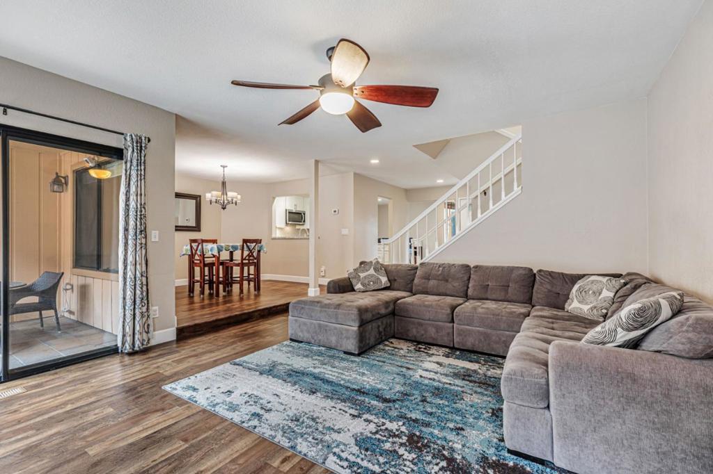This 3-bedroom, 2.5-bath townhouse blends fresh updates with a smart layout, offering 1,716 sq ft designed to be an easy place to call home. The open-concept layout features a gated front walkway & a 2018-renovated kitchen with quartz countertops, a breakfast-bar island, stainless steel appliances, soft-close cabinetry & recessed lighting. Off the kitchen is a spacious dining area & an even larger flex space ideal for a home office, play area, or conversion to a 4th bedroom. The living room, with tall windows, a ceiling fan & gas fireplace, opens through sliding doors to a large, partially covered backyard with pavers. Upstairs, the primary suite features vaulted ceilings, a walk-in closet, a ceiling fan & double doors to its own private balcony. The en-suite bath, renovated in 2021, includes a double vanity, new flooring & a large walk-in tiled shower. Two additional bedrooms offer mirrored closet doors, ceiling fans, crown molding & access to a shared balcony. The hall bathroom, also renovated in 2021, features a fresh vanity, tile floors & a tiled surround for the acrylic soaking tub. Air conditioning ensures year-round comfort. In a welcoming neighborhood known for its occasional block parties, residents enjoy tennis courts, two pools & quick access to Hwy 101 & Caltrain.