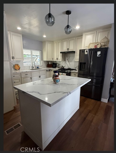 Welcome to Carson Harbor Village! This charming 3-bedroom, 2-bathroom home has been beautifully updated over the last two years with a modernized kitchen, renovated bathroom, and a new roof. The property has been thoughtfully expanded from a 2-bedroom to a spacious 3-bedroom layout, offering plenty of room to grow. With a washer and dryer hookup and a relaxing outdoor patio space perfect for summer and fall, this home is ready for you to enjoy. It is being sold as-is, offering a wonderful opportunity to make it your own!