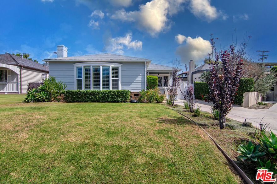 Traditional single story with 4 beds + 3 baths + large remodeled kitchen + private grassy yard on quiet tree lined street close to The Grove.  Long driveway for off street parking and covered front porch at the entrance.  Formal entry opens to living, dining, and hallway to bedrooms.  Living room with fireplace, picture window to the street, and built in bookcases.  Dining room with character molding and large windows that pool sunshine.  Huge remodeled kitchen with center island, oversized fridge/freezer, double wall ovens, double sinks, double dishwashers, abundant cabinets and countertop space.  Primary bedroom suite overlooks yard and has double vanity, separate shower + tub, walk-in closet with built-ins. 3 additional beds + 2 baths. Laundry room opens to the private grassy yard.  Hardwood floors, central HVAC, recessed lights.  Just a stone's throw from The Grove, Pan Pacific Park, shops, restaurants, local attractions!  Amazing opportunity!!!