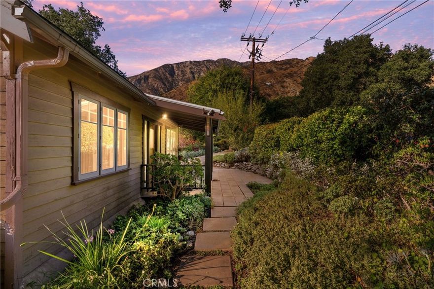 Welcome to your Sierra Madre retreat! Nestled in the peaceful canyon area, this charming 2-bedroom, 1-bath home sits on an oversized 7,349 sq ft double lot, offering a rare combination of privacy, space, and natural beauty. This includes a detached 2 car garage and additional space for 3 more parking spaces. Surrounded by mature trees and mountain views, the property provides a serene escape while still being close to the heart of Sierra Madre’s quaint shops, dining, and hiking trails. The cozy interior is filled with natural light and warm character, creating an inviting atmosphere. With ample outdoor space, this property is perfect for gardening, entertaining, or simply enjoying the tranquil canyon setting. The expansive lot also offers exciting potential for future expansion or customization. Do not miss this unique opportunity to own a special home in one of Sierra Madre’s most sought-after neighborhoods.
