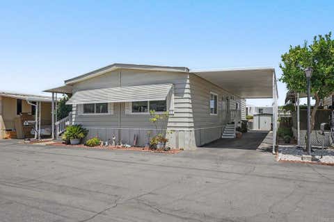 Photo of 11949 Riverside Dr DR #114, Lakeside, CA 92040 (MLS # PTP2605235)