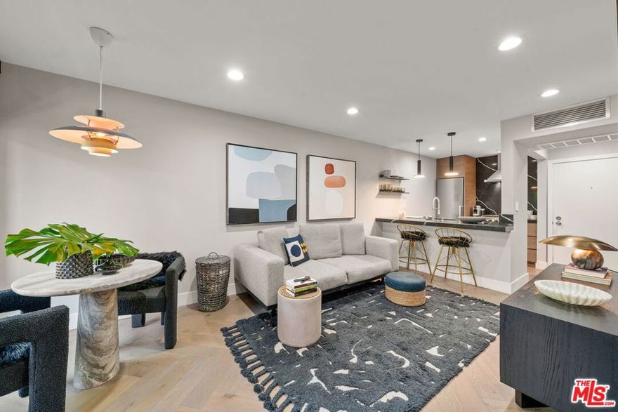 Sophisticated and chic, this beautifully remodeled studio in prime West Hollywood showcases herringbone-pattern wood floors, a thoughtfully designed layout, and refined finishes throughout. The open living space extends to a private balcony, offering an elegant retreat for morning coffee or evening cocktails. Set within a gated community with lush, park-like grounds, residents enjoy resort-style amenities including a pool and spa, fitness center, and secure parking. A rare opportunity to experience luxury living on a smart scale in one of West Hollywood's most coveted neighborhoods.
