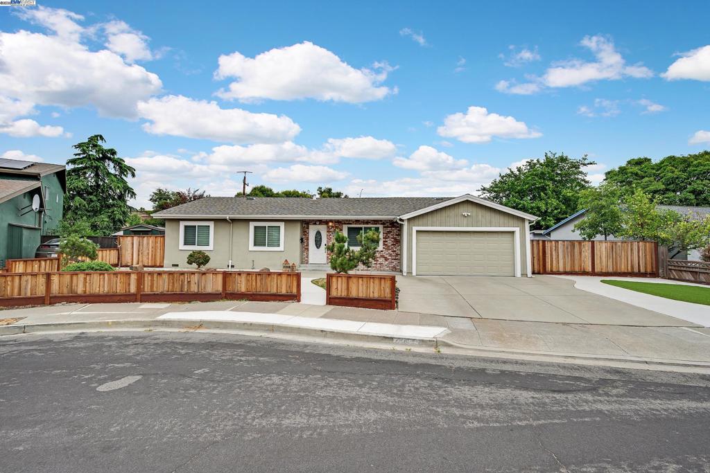 Welcome to this beautifully maintained 4-bedroom, 2-bath single-family home offering nearly 1,400 sq. ft. of comfortable living space on an expansive 9,600 sq. ft. lot with no rear neighbors. Step inside to find a light-filled open layout, featuring a stylishly updated kitchen with sleek countertops, modern cabinetry, and stainless steel appliances. The renovated bathrooms exude spa-like comfort with contemporary finishes. Enjoy year-round comfort with central AC, while the low-maintenance yard offers the perfect blend of usable space and easy upkeep. The massive backyard is ideal for entertaining, gardening, or simply relaxing in privacy. Located in a quiet, desirable neighborhood near top-rated schools, parks, shopping, dining, and commuter routes — this home combines charm, functionality, and an unbeatable location.