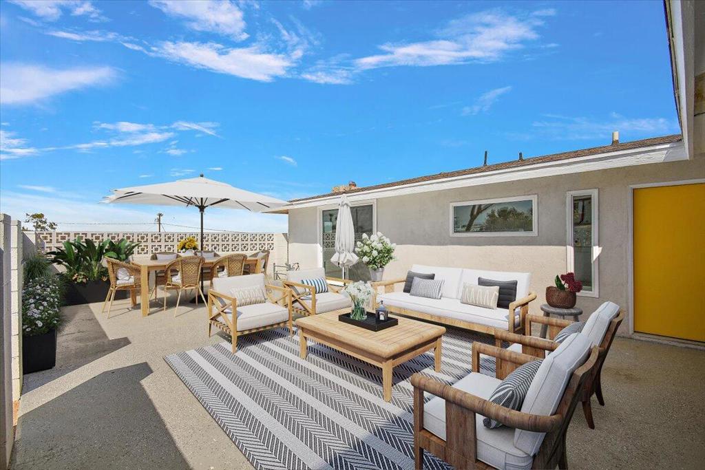 This beautifully remodeled mid-century home sits atop Joshua Tree Village, offering breathtaking mountain and city views. Featuring 3 bedrooms and 2 baths, the inviting open floor plan is filled with natural light.A spacious front courtyard provides ample room for outdoor entertaining and connects to a cozy game room near the primary suite. The kitchen, equipped with brand-new stainless steel appliances, and quartz counter tops flows seamlessly into the living area, which boasts a charming fireplace.The primary bedroom includes a stunning new en-suite bath with all-new fixtures, a walk-in shower, a large soaking tub, and a new toilet. Adjacent to the primary suite is a versatile bonus room with its own fireplace and private patio--ideal for family gatherings or guest entertainment.Two additional bedrooms, a generously sized laundry room with backyard access, and a fenced yard with a gated driveway enhance the home's functionality. A detached workshop/she shed offers additional storage or creative space.Nestled on an 8,250 sq. ft. corner lot that is fully permitter fenced, this home captures sweeping hillside views to the north and stunning views of the city lights in the evenings. Located in a prime Joshua Tree Village area, it's within walking distance of shops, the farmers market, Joshua Tree Saloon, restaurants, and more. This beautifully remodeled home is priced to sell and won't last.