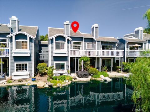 Photo of 8192 Sandcove Cir #204, Huntington Beach, CA 92646 (MLS # OC26074566)