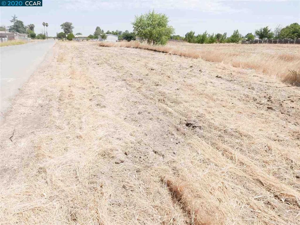 3 lots in a row to be sold together. Attn: developers and investors. 5 large each approx. 9,950 sq. ft. residential lots to build on. Only $24,000 each when purchased together at this one low price. Close to HWY 99 Easy access to Madera and Chowchilla. Water and electricity in street. A recent Elevation Certificate has been done for lot 12. The rest should be similar. Ready for your builder.