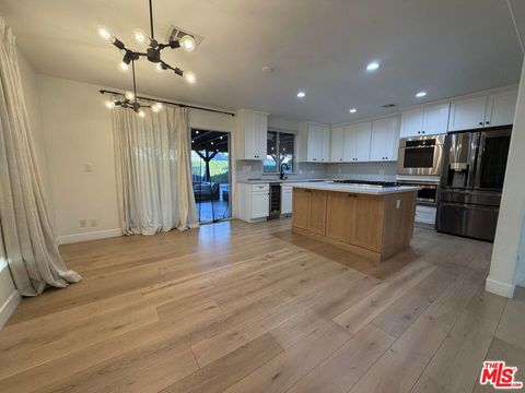 Photo of 7656 Capistrano Avenue, West Hills, CA 91304 (MLS # 25628067)