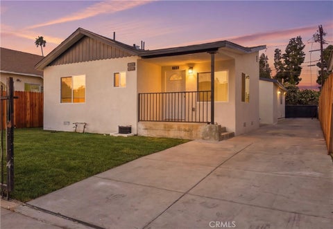 Photo of 817 W 79th ST, Los Angeles, CA 90044 (MLS # DW26193190)