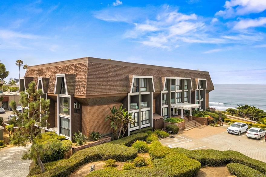 Luxury Coastal Condo in the Heart of Del Mar Village | Ocean Views & Resort Amenities. Welcome to The Sandpiper — a beautifully remodeled and turnkey 1-bedroom, 2-bathroom end-unit condo offering the best of Del Mar beach living. Located in a secure, boutique 3-story building with subterranean parking and elevator access, this rare offering includes exclusive use of L’Auberge Del Mar Resort amenities: a heated pool and spa overlooking the Pacific, 24/7 fitness center, and two tennis courts. Expertly redesigned by Jantz Construction, the interior features include:  Quartz kitchen and bath countertops. Custom-built cabinets and soft-close drawers. Luxury vinyl plank flooring. Triple-pane sound-resistant windows & QuietRock drywall. Recessed LED lighting & window A/C. Full-size stackable washer/dryer. Custom blinds fitted to all windows and sliding doors.  Enjoy ocean views from the dining area and balcony, along with the privacy and natural cross-breezes of a desirable end unit. The location is unbeatable — just steps to the beach, Powerhouse Park, Del Mar Plaza, fine dining, boutiques, and the iconic L’Auberge Del Mar Hotel’s restaurant and bar. Easy access to freeways, Torrey Pines Reserve, downtown San Diego, and world-class attractions makes this a perfect full-time residence or luxury second home. Live the Del Mar lifestyle — refined, walkable, and unforgettable.