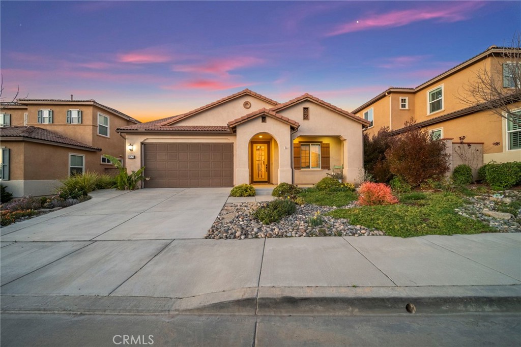 Nestled in Temecula’s most coveted gated community, this exquisite two-story home lives like a single story, offering a private downstairs primary suite tucked away from the other bedrooms for ultimate comfort. Upon entry, a spacious office with solid French doors provides the perfect space for remote work or can effortlessly serve as a fourth bedroom. As you make your way down the wide entry hall, you’ll be captivated by the abundant natural light and open-concept design, seamlessly blending the kitchen, dining, and living areas into one inviting space. The heart of the home extends outdoors to an expansive 40-foot covered Allumawood patio, an entertainer’s dream, complete with a custom 15-foot built-in BBQ island featuring premium Twin Eagles appliances, including a high-performance 70,000 BTU power burner and a Blaze outdoor refrigerator. Designed with the future in mind, the backyard is already equipped with gas and electric for a potential pool and spa, while the garage offers a 60-amp EV charging station alongside additional lighting and electrical enhancements. Upgrades include new hard surface flooring and carpet, as well as LED lighting throughout, ensuring modern efficiency and style. Situated on a single-loaded street with no neighbors in front or behind, this home offers both privacy and ample parking, all while being just minutes from Temecula Wine Country. Within the highly desirable Roripaugh Ranch community, residents enjoy resort-style amenities, including a pool, spa, fitness center, tennis courts, yoga studio, private two-acre walking trail, and multiple parks. Combining luxury, convenience, and an unbeatable location, this stunning home is truly a rare find—schedule your private showing today!