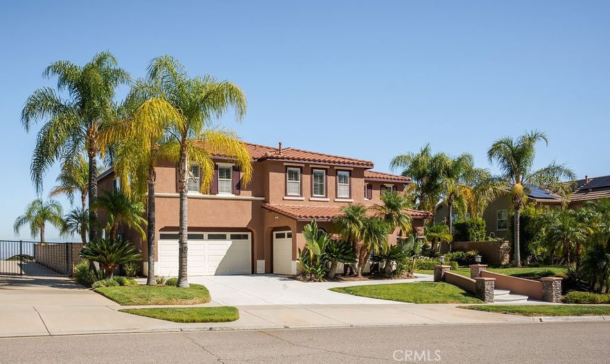 Set on a 10,454 sqft lot with 3,829 sqft of beautifully designed living space, this executive residence in highly sought-after Eagle Glen pairs everyday comfort with resort-style living and jaw-dropping views.
Step inside to an elegant, flexible floor plan featuring a formal living room, formal dining room, a private office (easily a 5th bedroom), and an oversized loft (convertible to a 6th bedroom). The chef’s kitchen impresses with granite countertops, stainless steel appliances, a large center island, and a sunny breakfast nook—fully open to the inviting family room with a fireplace for effortless entertaining.
Retreat upstairs to the luxurious primary suite with its own fireplace, spa-inspired bathtub, well lit vanity, huge walk-in closet, and a private balcony framing sweeping mountain and city-light vistas.
Outside, the backyard lives like a private resort: saltwater pool and spa, built-in BBQ island, fire pit, and a putting green—all perfectly oriented to showcase those spectacular views.
Premier Eagle Glen location near the golf course, parks, shopping & dining. Convenient access to major freeways and top-rated schools