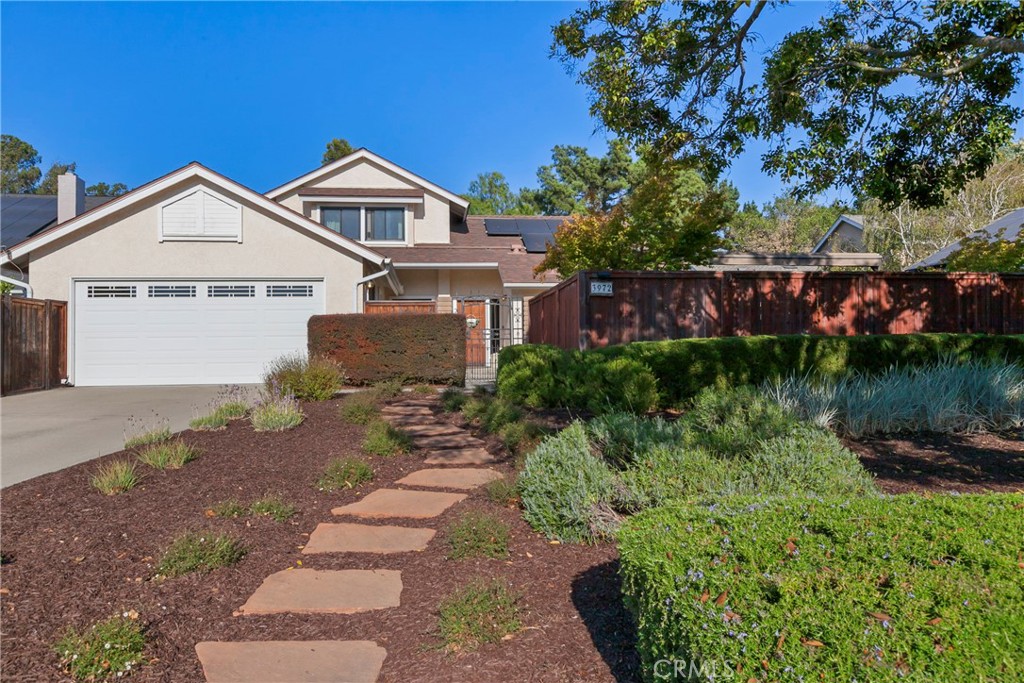 Experience refined living in this beautifully appointed 4-bedroom, 3-bath home, ideally situated in one of the area's most desirable neighborhoods—just minutes from upscale shopping, fine dining, wineries, and everyday conveniences. Designed with both comfort and sophistication in mind, this spacious home features an exceptional floor plan. The main level boasts a luxurious primary suite and two additional bedrooms, offering ease of access and everyday functionality. Upstairs, a second private suite with its own en-suite bath provides an ideal retreat for guests or multigenerational living. Gorgeous wood-trimmed dual-pane windows and sliding doors throughout that add elegance and elevated sophistication. This home comes complete with Solar power for ultimate efficiency. Enjoy seamless indoor-outdoor living with charming patio spaces, perfect for relaxing or entertaining. A thoughtfully designed outdoor shed offers a tranquil escape for creative pursuits or quiet relaxation. Immaculately maintained and move-in ready, this home blends timeless style with modern comfort — a rare opportunity in a prime location.