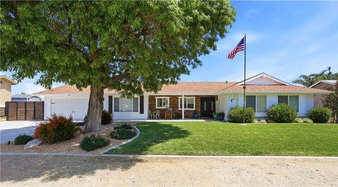Photo of 5302 TRAIL CANYON Dr, Jurupa Valley, CA 91752 (MLS # IV26077990)