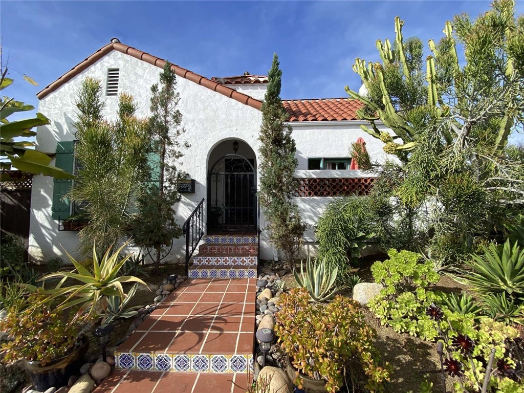 This 3-bedroom, 2-bath Spanish Revival treasure, built in 1927, radiates timeless charm and character. From its graceful arches to its hand-crafted details, every corner whispers of a bygone era—lovingly preserved and thoughtfully updated for modern living. Whether you are sipping coffee on the sunlit breakfast nook, hosting friends in the elegant living room or creating memories in the cozy sandstone covered backyard, this home invites you to slow down, savor, and truly feel at home.
Interior Features:
Vaulted ceilings and gas-burning fireplace Hardwood and tile flooring Granite countertops in a designer kitchen Full suite of appliances: LG Refrigerator, Viking Range/Oven, Dishwasher, Microwave, Washer & Dryer, Garbage Disposal Central A/C and forced air heating (gas-powered) Window treatments
Exterior & Outdoor Living:
Stucco exterior with Spanish tile roof 2 total parking spaces Fenced yard, sprinkler system Multiple outdoor spaces: Patio, Courtyard, Stone covered backyard Level corner lot with drought tolerant landscape
Bonus Spaces:
Detached garage conversion to a Studio – 272 square feet, perfect for guests or ideal for creative pursuits
Neighborhood Highlights:
Located a block away from Adams Ave in the heart of Kensington, one of San Diego’s most beloved historic neighborhoods, this home offers a walkable lifestyle with tree-lined streets, charming cafes, breweries, restaurants and boutique shops.
You're just minutes from:
Normal Heights – known for its eclectic vibe, music venues, and local eateries University Heights – offering a mix of historic charm and trendy dining spots Talmadge – a quiet, residential enclave with classic architecture and community spirit North Park – a cultural hub with art galleries, craft breweries, and vibrant nightlife
Whether you're strolling to dine or exploring nearby parks and farmers markets, this location offers the perfect blend of urban convenience and neighborhood charm.