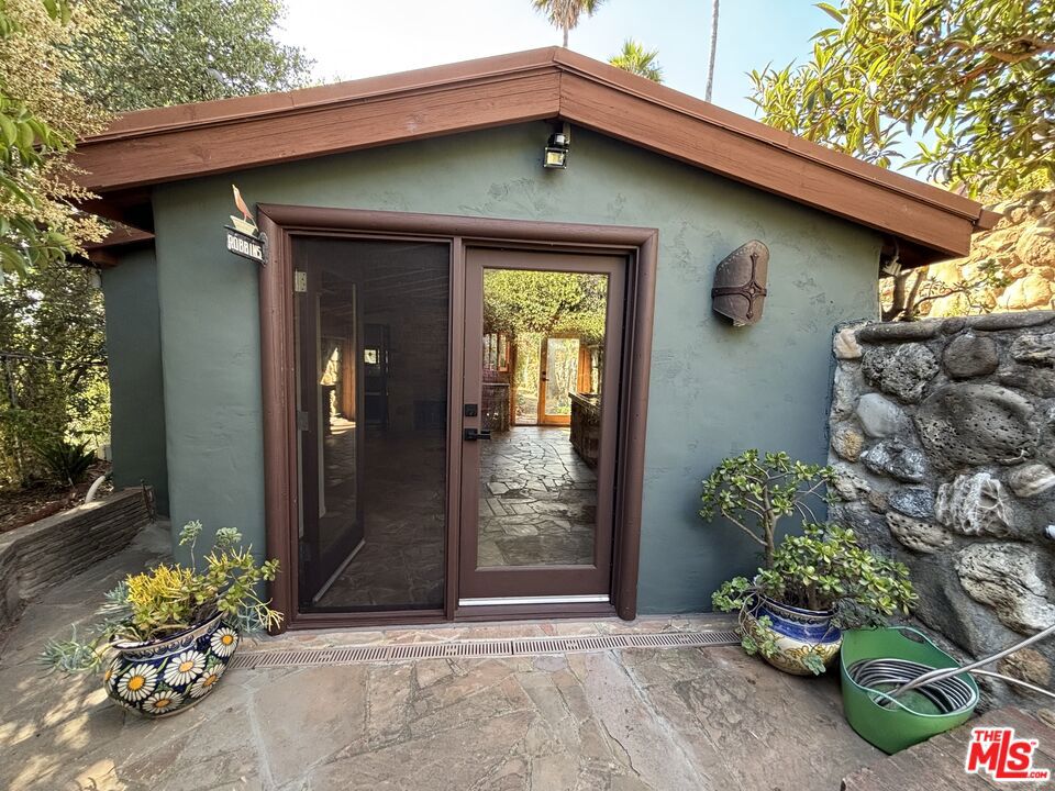Peaceful, quiet, and private rustic detached guest house with quintessential "Old Malibu" charm nestled within this welcoming neighborhood in beautiful Corral Canyon. Private garden views from within this sweet setting, and ocean views from a common space sitting area. Lease includes one designated parking spot. Minutes drive to some of Malibu's best sandy beaches, hiking & biking trails, restaurants, & shopping.