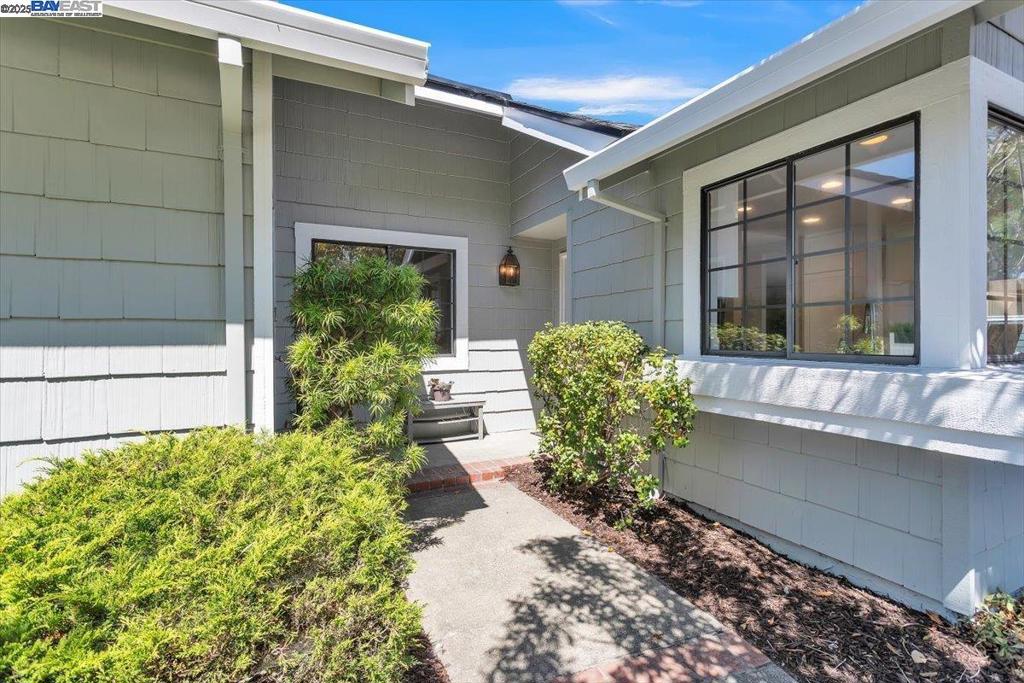 Bright & Airy SINGLE LEVEL in lovely Bayfarm • Desirable corner 4385 sqft lot • Not a townhome • Fresh coastal-inspired exterior paint (May 2025) • Brand-new roof installed (May 2025) • Extensive exterior repairs • 2-car garage with epoxy-coated floor • Floating garage storage cabinets plus additional storage • Washer & dryer included • Central air-conditioning • Low HOA dues: $180/month • Private low maintenance backyard retreat and side yard • Award winning school district & close to starbucks, groceries, eateries airport, golf Living/Dining-- • Bright open-concept layout with abundant natural light • Vaulted Ceilings • Warm engineered flooring • Cozy fireplace • Slider for seamless indoor-outdoor flow • Charming stained-glass accent window Kitchen-- • Gorgeous cabinets w/soft close doors and drawers • Newer SS appliances and hot water dispenser • Contemporary backsplash paired with sleek white quartz countertops • Breakfast bar • Pull-out pantry rack shelves for organization Primary Suite-- • Spacious private suite at the rear of the home • Vaulted Ceilings • 2 closets w/wardrobe systems • Slider to the backyard Second Bedroom-- • Roomy and well-lit—ideal for guest or office use Elegant Bathrooms-- • New vanities, modern fixtures & lighting
