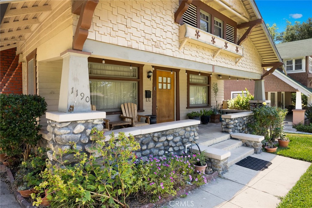A Diamond in the Rough in Pasadena’s Iconic Bungalow Heaven. Nestled in the heart of Pasadena's cherished Bungalow Heaven, this classic single-story bungalow is brimming with character, charm, and untapped potential. A true gem from the early 20th century, the home is a testament to the Arts and Crafts movement—celebrated for its emphasis on natural materials, fine craftsmanship, and thoughtful architectural details. From the moment you arrive, you're welcomed by a large, inviting front porch framed with tapered columns and a distinctive gable dormer adorned with gingerbread siding and intricate detailing. River rock accents, low-pitched roofs, and wide overhanging eaves speak to the home's timeless appeal. Inside, original crown molding, wood floors, and an abundance of double-hung wood windows showcase the warmth and light-filled ambiance. The living room is accentuated by an impressive fireplace with a vintage façade. The spacious kitchen features a charming built-in breakfast nook, perfect for morning coffee or casual meals. A separate laundry room adds convenience, while a covered patio extends your living space outdoors. Situated on a generous lot, the property includes a detached garage and a separate storage unit—space for an ADU (Accessory Dwelling Unit), home office, or studio. The backyard also offers a gazebo providing the perfect setting for entertaining, BBQ time or relaxing in the shade. Whether you're looking to restore a historic home to its original glory or add your personal touch to create something new, this property offers endless possibilities in one of Pasadena’s most desirable and architecturally significant neighborhoods. Offers are due August 28 at 6:00 P.M.