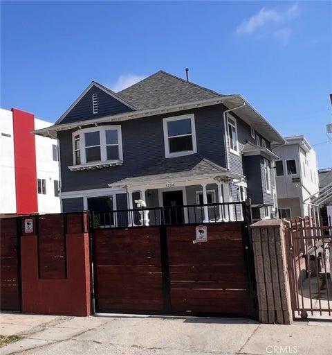 Photo of 1224 W 35th Street, Los Angeles, CA 90007 (MLS # AR26126193)